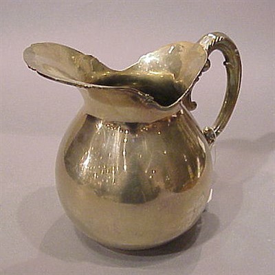 Lot 307 - Two Sterling Silver Water Pitchers Total...