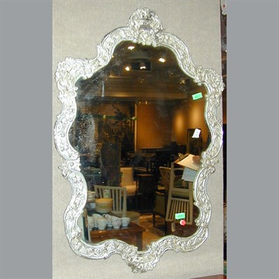 Lot 424 - Rococo Style Silver Framed Mirror