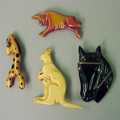 Lot 448 - Group of Four Bakelite Brooches Each depicting...