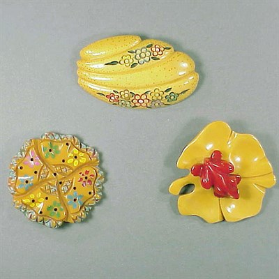 Lot 425 - Group of Three Bakelite Brooches Two with...