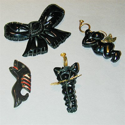 Lot 547 - Group of Four Bakelite Brooches Each of...