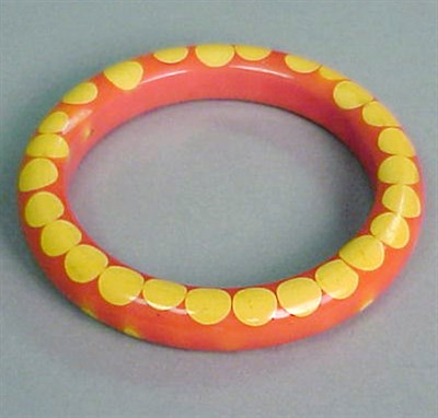 Lot 321 - Bakelite Random Dot Bracelet In orange with...