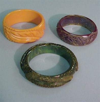 Lot 316 - Group of Three Bakelite Bracelets Each in...