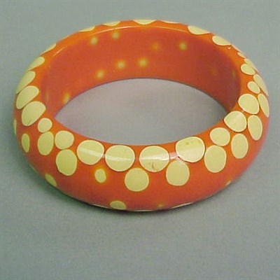 Lot 473 - Bakelite Random Dot Bracelet In orange with...