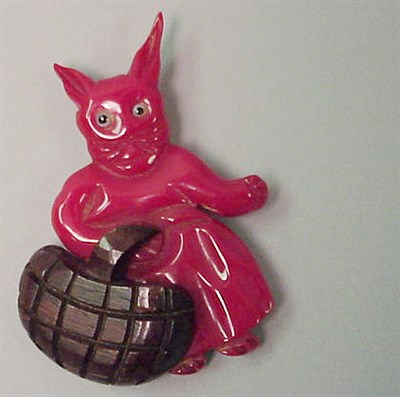Lot 535 - Bakelite and Wood Brooch Depicting a rabbit...
