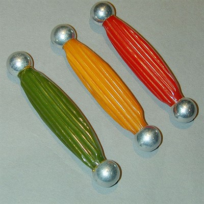 Lot 553 - Set of Three Bakelite and Metal Brooches Each...