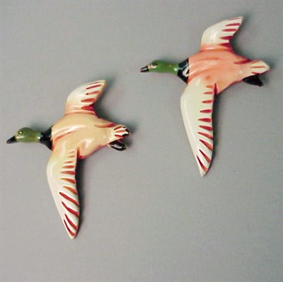 Lot 614 - Pair of Bakelite Brooches Each depicting a...