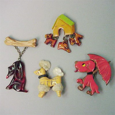 Lot 339 - Group of Four Bakelite Dog-Form Brooches...
