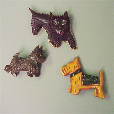 Lot 341 - Group of Three Bakelite Dog-Form Brooches...