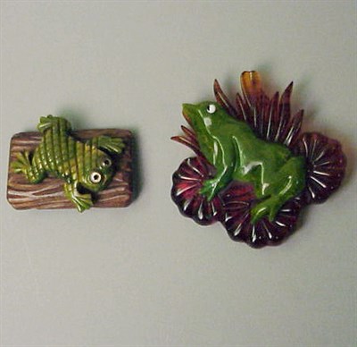 Lot 638 - Two Bakelite Brooches Each depicting a frog on...