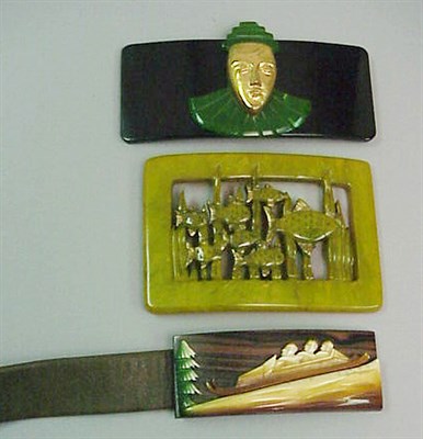 Lot 633 - Two Bakelite Belt Buckles Each of various form....