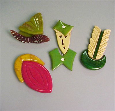 Lot 636 - Group of Four Bakelite Two-Piece Belt Buckles...
