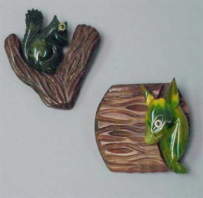 Lot 276 - Two Bakelite and Wood Brooches Each depicting...