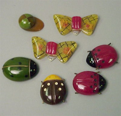 Lot 379 - Group of Seven Bakelite Dress Clips Each of...