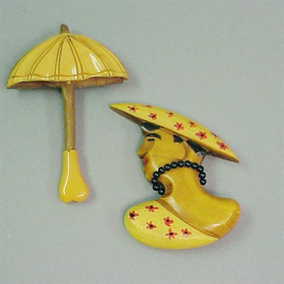 Lot 352 - Bakelite Brooch Depicting a profile of a woman....