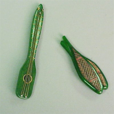 Lot 353 - Bakelite and Brass Brooch Depicting a sitar....