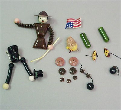 Lot 466 - Two Bakelite Articulated Figural Brooches...