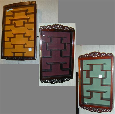 Lot 287 - Three Chinese Hardwood Glass Front Wall...