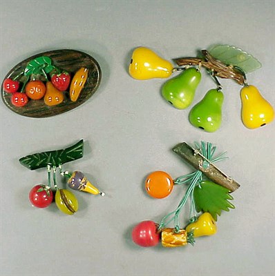 Lot 434 - Group of Four Bakelite and Wood Brooches Each...