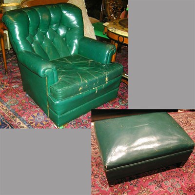 Lot 173 - Leather Upholstered Armchair and Ottoman