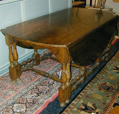 Lot 160 - Provincial Georgian Style Oak Gate-Leg Table