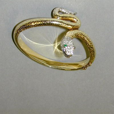 Lot 125 - Gold and Diamond Snake Bracelet 14 kt. yellow...