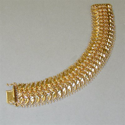 Lot 168 - Gold Flexible Bracelet 18 kt. yellow gold, of...