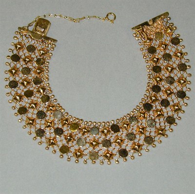 Lot 108 - Gold Flexible Bracelet 18 kt. yellow gold, the...