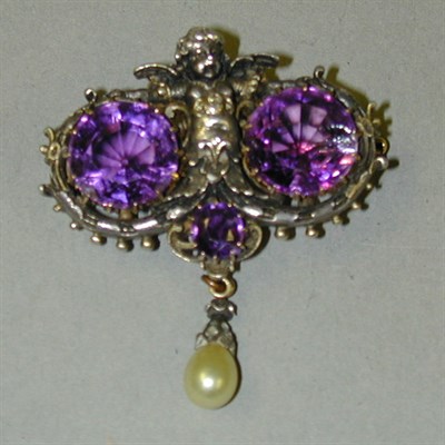 Lot 73 - Antique Amethyst Pin The silver pin designed...