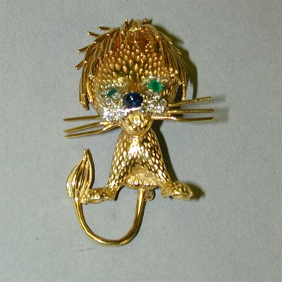 Lot 99 - Gold Lion Pin 14 kt. yellow gold, set to the...