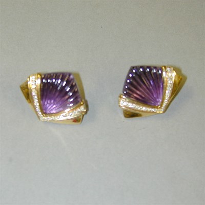 Lot 336 - Pair of Amethyst and Diamond Earclips 18 kt....