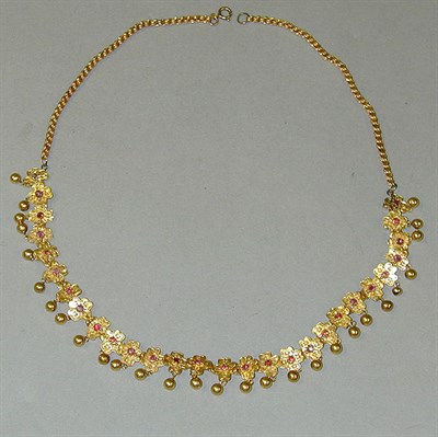Lot 337 - Gold Flower Necklace 18 kt. yellow gold, the...
