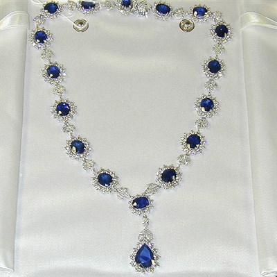 Lot 344 - Sapphire and Diamond Necklace 18 kt. white...