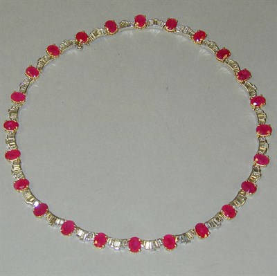 Lot 340 - Ruby and Diamond Necklace 18 kt. white and...