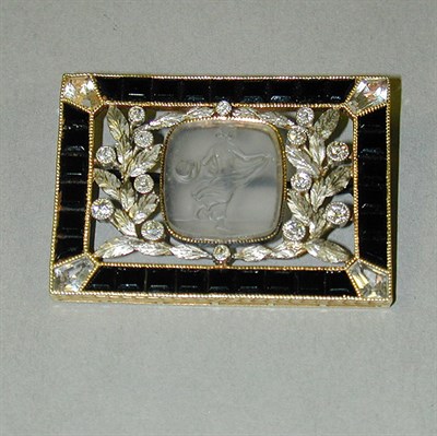 Lot 401 - Classical Style Pin 14 kt. white and yellow...