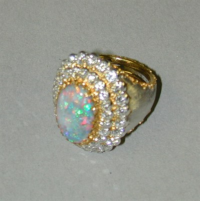 Lot 328 - Opal and Diamond Cluster Ring 18 kt. white and...