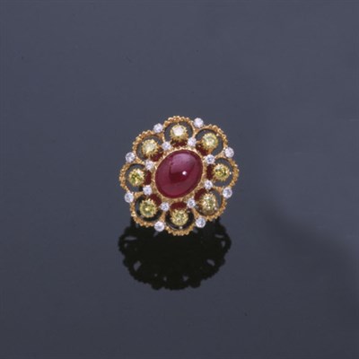 Lot 366 - Ruby and Yellow Diamond Ring 18 kt. yellow and...