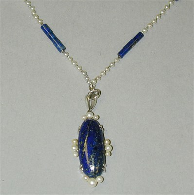 Lot 162 - Lapis-Lazuli and Natural Pearl* Pendant and...