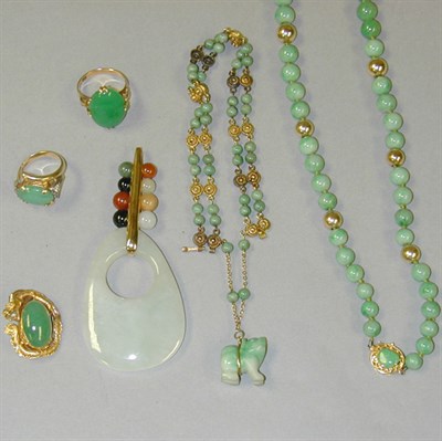 Lot 250 - Lot of Assorted Jade Jewelry 14 kt. yellow...