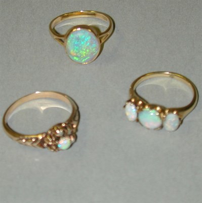 Lot 44 - Three Opal Rings 14 kt. yellow gold, variously...