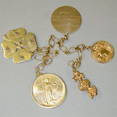 Lot 164 - Gold Charm Bracelet 14 kt. yellow gold, the...