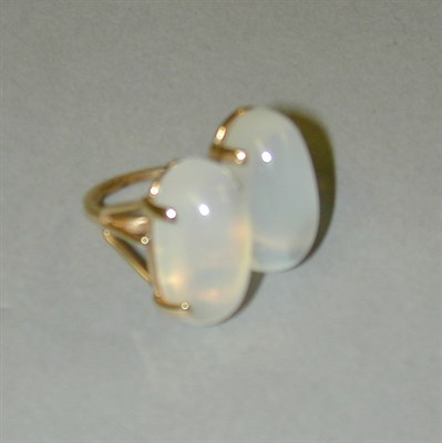 Lot 63 - Double Moonstone Ring 14 kt. yellow gold, the...