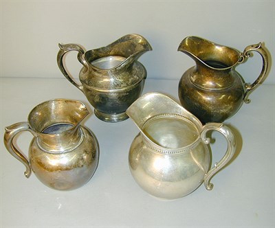Lot 339 - Group of Four Sterling Silver Water Pitchers...