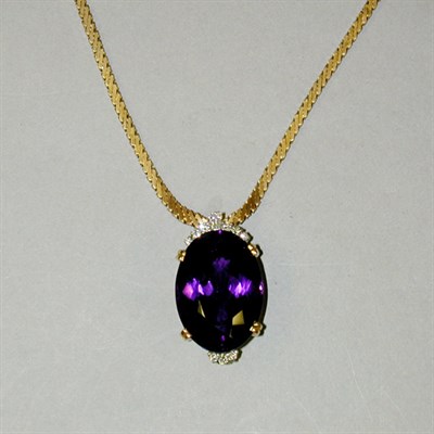 Lot 199 - Amethyst and Diamond Pendant and Chain 14 kt....