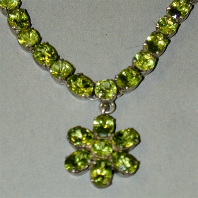 Lot 360 - Peridot Necklace Silver, set altogether with...