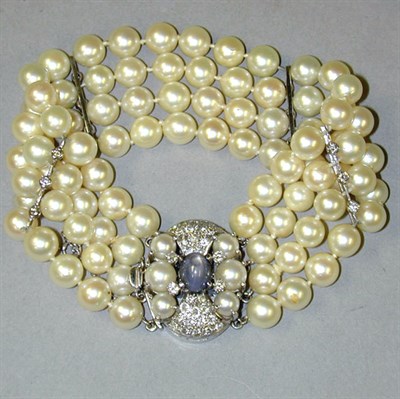 Lot 160 - Cultured Pearl and Diamond Bracelet The four...