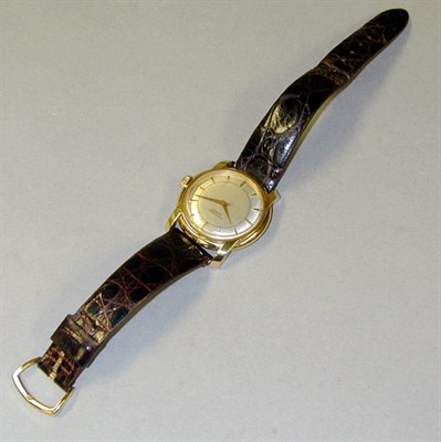 Lot 226 - Gentleman's Gold Wristwatch The leather band...