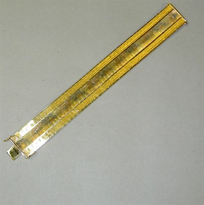 Lot 124 - Flexible Gold Bracelet 18 kt. gold, the 7/8...