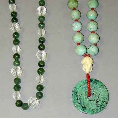 Lot 137 - Two Bead Necklaces Comprising one nephrite...