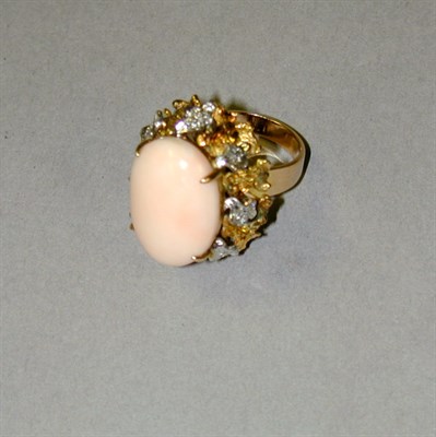 Lot 155 - Coral and Diamond Ring 14 kt. yellow gold, the...